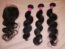 Nadula pelo Hd Cierre de encaje brasileño de la onda del cuerpo de mechones con cierre 4x4 Cierre de encaje brasileño extensiones de pelo ondulado mechones con cierre