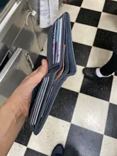 Cartera corta de cuero recubierto para hombre, billetera Retro de triple Vertical, billetera coreana para jóvenes, varias tarjetas, moda 2020