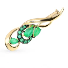 Золотая брошь с изумрудами SUNLIGHT проба 585