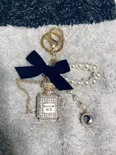 2020 nuevo de imitación de la perla botella de Perfume con llavero coche Soporte para Llavero bolsa encanto colgante accesorios arco clave Cadena de llavero