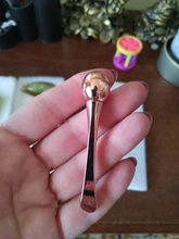 Rodillo de masaje para ojos, aplicador de Crema para Ojos, espátulas cosméticas, cuchara Facial antiarrugas, herramienta de cuidado de adelgazamiento Facial de aleación dorada, 1 ud.