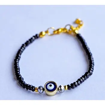 

BRACELET HAND MADE WOMEN WITH BLACK STONE - Handmade black stone bracelet with evil eye bead in middle