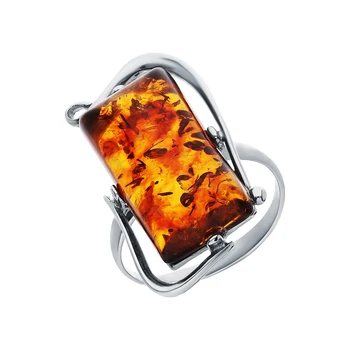 

Silver ring with amber sunlight