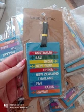 Etiqueta de equipaje de PVC con nombre de ciudad a la moda, soporte para dirección, etiqueta de equipaje, identificador de silicona, accesorios de viaje