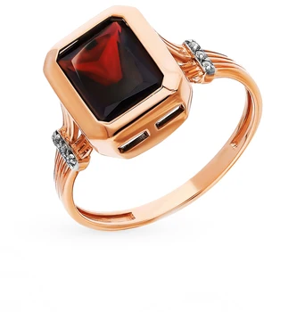 

Gold ring with Topaz and Garnet sunlight sample 585