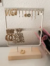 Soporte de exhibición para pendientes de tuerca de Metal con Base de madera, organizador de pendientes con 24/44/66 agujeros, venta al por mayor