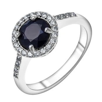 

Ring made of silver with natural corundum (U) and cubic zirconia.