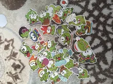 10/30/50 unids/pack juego caliente cortar la cuerda Om Nom pegatina de rana portátil de ordenador de monopatín teléfono móvil de dibujos animados maletero