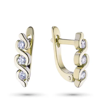 

Earrings in yellow gold with a diamond