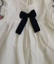 Vestidos de algodón con lazo para niñas, falda blanca y azul marino con volantes, chaleco con cuello redondo