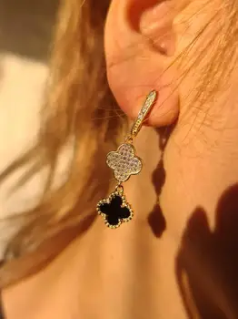 

Silver earrings rhodium plated with clover, cubic zirconia and Onyx
