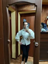 Blusa con manga de linterna para mujer, camisa holgada con botones a la moda para primavera y otoño, Color liso