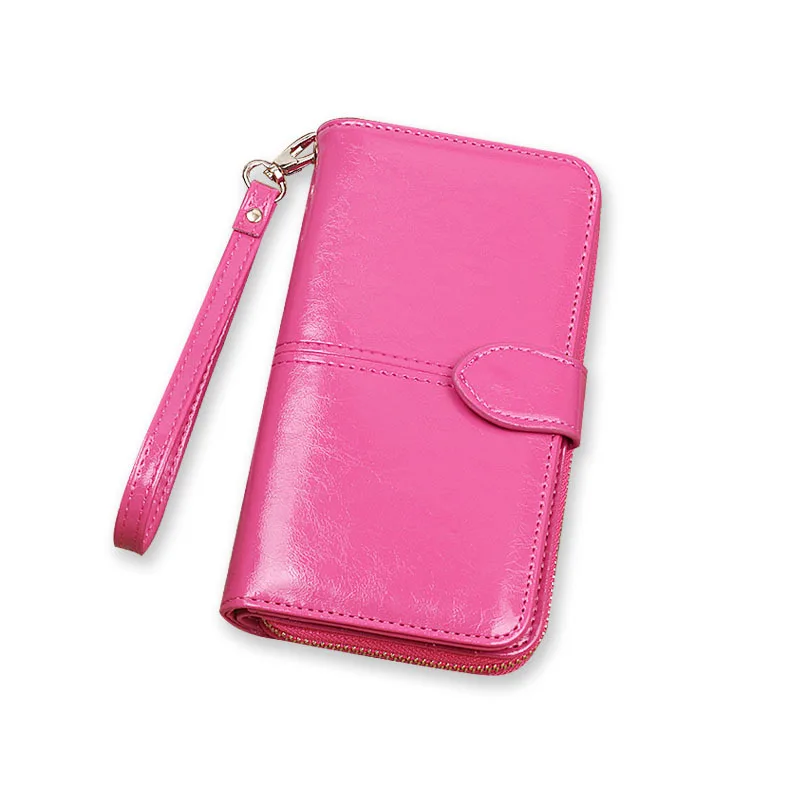 A long pink Long Women Wallets Pu Leather with a wrist strap.