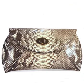 

TRENCADÍS. Leather bag. Clutch snakeskin Python. Be night made handbag
