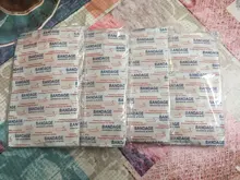 Vendaje de primeros auxilios para heridas, cojín adhesivo impermeable y transpirable para hemostasia, 100 unids/lote