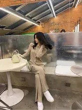 Suéter de Color sólido trajes de las mujeres conjuntos de gran tamaño pantalones de lana pantalones de rollo Collar de punto Top con mangas acampanadas 2021 Primavera Verano