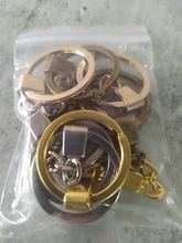 10 Uds. De llaveros (tamaño del anillo: 30mm), llaveros chapados en rodio y bronce de 50mm de largo, llaveros de partido redonda P6680