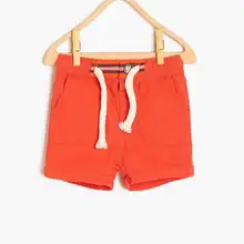 Coton Kids/детские красные шорты с ластовицей для мальчиков