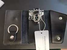 Billetera de cuero genuino de vaca para hombre y mujer, bolsa para llaves multifunción con hebilla de calidad a la moda, organizador de llaves con los titulares de ama de llaves