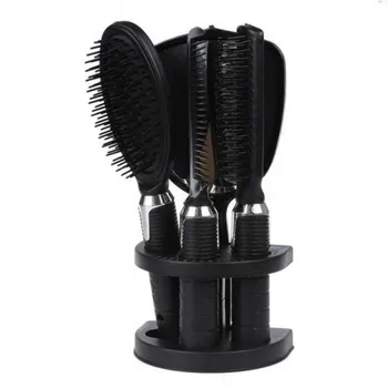 

A set of Combs on a stand with a mirror, 5 items.