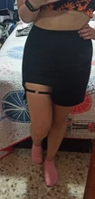 Estilo coreano negro paquete de la cadera falda dobladillo Irregular lápiz Micro falda Sexy Slim mujeres Bodycon parte faldas