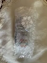 Cristal hermoso flor insignia retráctil carrete enfermera estudiante Exposición de tarjeta de identificación de cocodrilo Clip distintivo de papelería