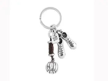 

Unode50 keychain with silver metal and leather football motifs