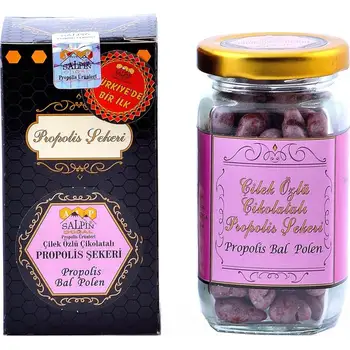 

Chocolate, honey, pollen, propolis, ginger, turmeric, galangal, cinnamon, clove, carob, germ, black seed, strawberry extract.