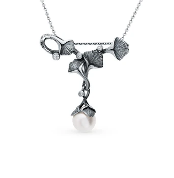 

Silver Pendant with cubic zirconia and pearls sunlight sample 925 test