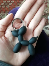 Nuevo creativo de dibujos animados globo de Llavero perro colgante anillo de hombres y mujeres par bolsa de llavero colgante venta al por mayor