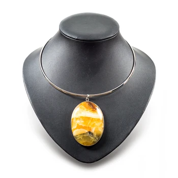 

Pendant with natural stone Simbircite. Frame of nickel silver