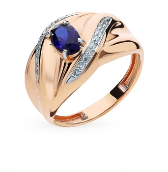 

Gold ring with sapphire and diamonds sunlight