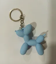 Nuevo creativo de dibujos animados globo de Llavero perro colgante anillo de hombres y mujeres par bolsa de llavero colgante venta al por mayor