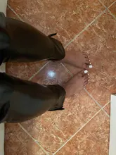 OrangeA de moda de las mujeres pantalones de piel de imitación Y2K pantalones dividir lápiz negro de alta cintura moda de calle elegante Sexy Slim Skinny Clubwear