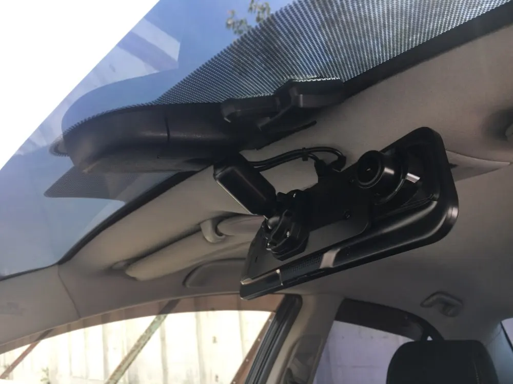 A rear view mirror bracket that allows removal of a factory mirror for a mirror cam is available