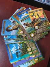 Juego de cartas de cognición de dinosaurios de Disney, 55 Uds., Cartas coleccionables de Anime de batalla, álbum de libros, juguetes para niños, regalos mayor de 3 años 8,7x6,3 cm