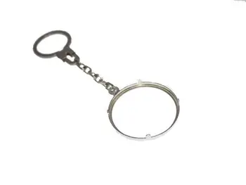 

Keychain sterling silver with ring nut to place coin or stone