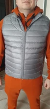 Chaleco de plumón de pato para hombre, chaqueta ultraligera sin mangas, acolchada, con cuello levantado, a prueba de viento, para invierno