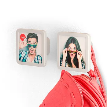 

Balvi-Klick wall hanger. Set of two hangers. Customizable with to photo. Made in plastic.