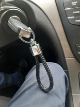 LLavero de lujo de alta calidad para coche, hebilla de herradura giratoria de 360 grados, cuero tejido a mano, colgante de bolso de Soporte para Llaveros para hombre y mujer