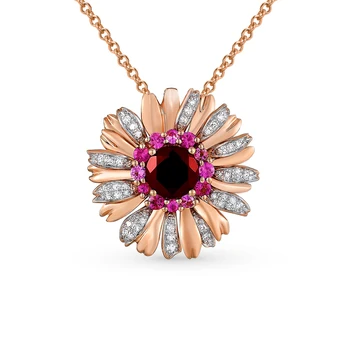 

Gold pendant with sapphires, Garnet and diamonds sunlight
