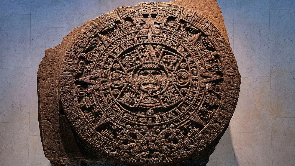 1200px-Aztec_calendar_stone_in_National_Museum_of_Anthropology,_Mexico_City