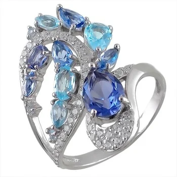 

Jewelry Tradition ring with cubic zirconia, tanzanites and Topaz Silver