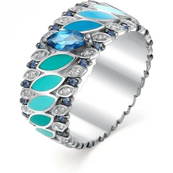 

Alcor ring with Topaz and cubic zirconia