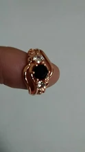 Huitan-Anillo de bruja para mujer, piedra negra única, ajuste giratorio, Diseño de banda, Color oro rosa, anillos de dedo de compromiso para mujer, venta al por mayor