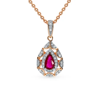 

Gold pendant with rubies and diamonds sunlight