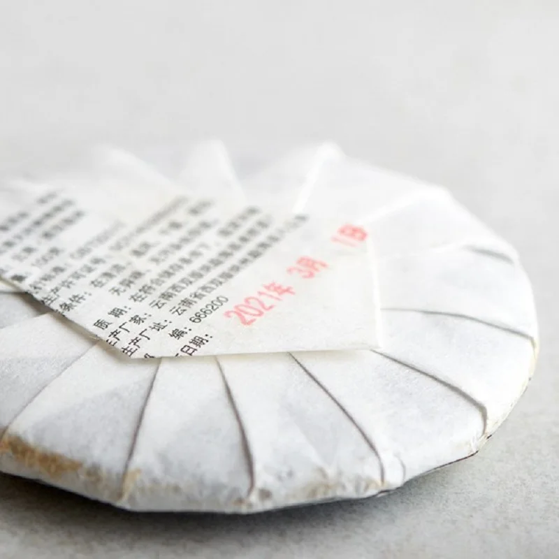 Tea Shu Puer Yiwu Xiao Bin, 2021, tea cake 100 grams. Puer, Puer tea, Puer top grade, Puer pancake, Puer 357, Puer pressed, Shu Puer,  Shu Puer top grade, Shu Puer tea, Shu Puer invigorating, Shu Puer menghai, Pu er