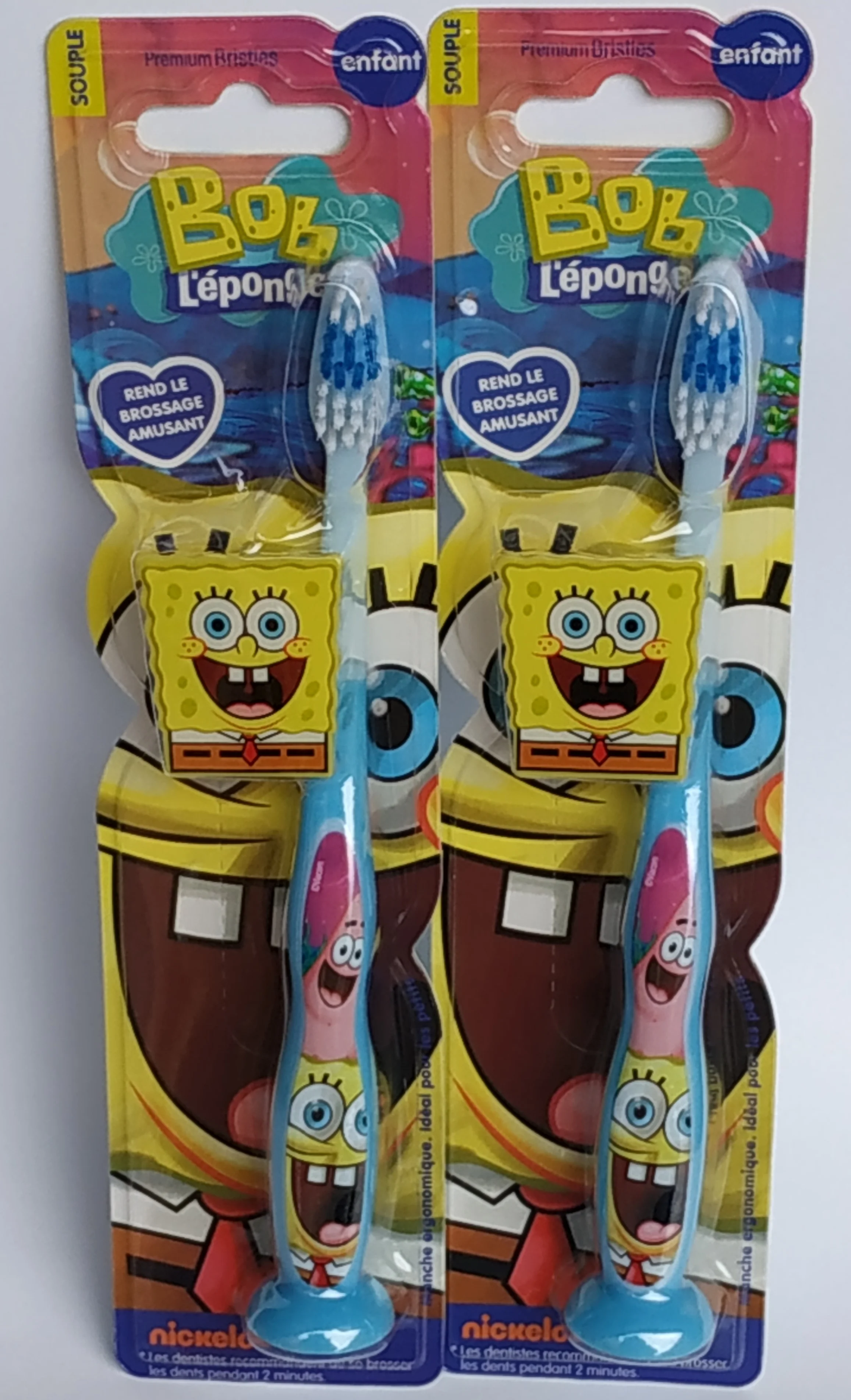 Упаковка cepillo ergonómico infantil BOB ESPONJA. 2 unidades. Con capucha protectora y ventosa en la base. TINOKOU|Зубные щетки|
