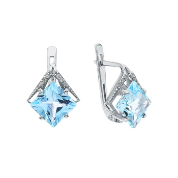 

Silver earrings with Topaz and cubic zirconia sunlight sample 925