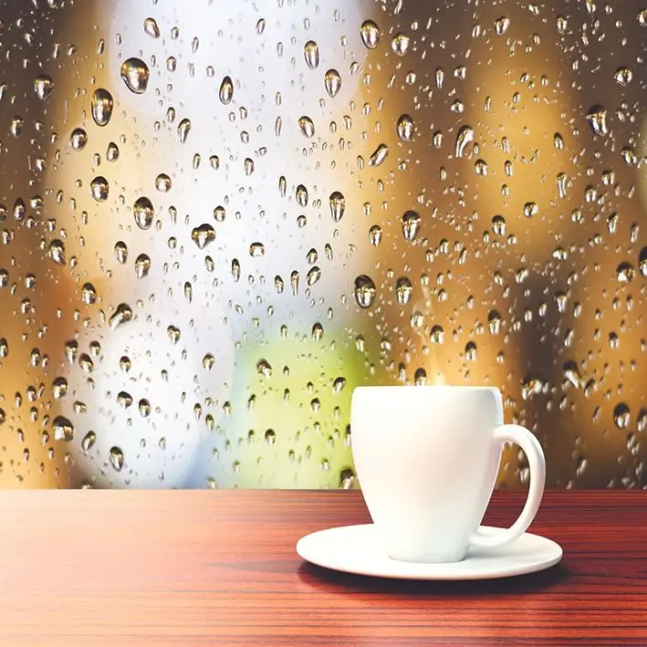 Cup of Coffee on the Background of the Window with Raindrops Rainy Morning Breakfast Time View Brown Gold White Curtain